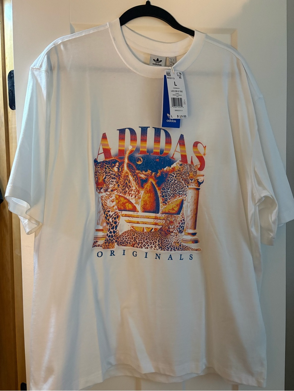 adidas Women’s  White Tee with Sunset Leopard Graphic size Large